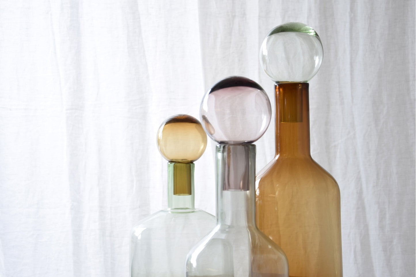 BOTELLA DE VIDRIO VERDE Y AMBAR PEQUEÑA