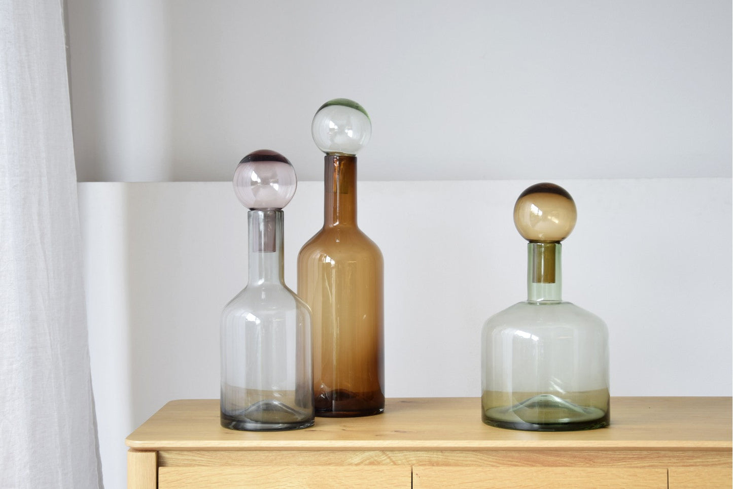 BOTELLA DE VIDRIO VERDE Y AMBAR PEQUEÑA