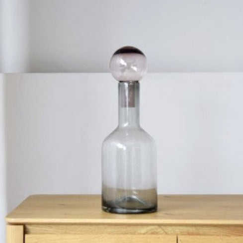 BOTELLA DE VIDRIO GRIS Y ROSA MEDIANA